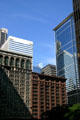 Grey Edison Building, red Marquette Building, & mirrored Chase Center. Chicago, IL.