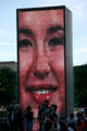 A thousand photos of faces from all ethnic groups are projected sequentially on the Crown Fountain Towers which contain arrays of LED screens in Millennium Park. Chicago, IL