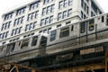 CTA transit train on elevated loop. Chicago, IL.