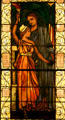 Stained glass window detail of Massachusetts Mothering the Coming Women of Liberty, Progress & Light from Women's Building of World's Columbian Exhibition at Stained Glass Museum. Chicago, IL.