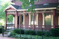 Home with Eastlake porch in Lockerbie historic district. Indianapolis, IN.