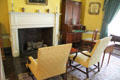 Counsel room fireplace with armchairs & drop front desk at Grouseland. Vincennes, IN.