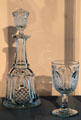 New England Pineapple pattern glass decanter by Boston & Sandwich Glass Co. plus pressed lead glass goblet at Wichita Art Museum. Wichita, KS.