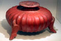 Colima squash-shaped ceramic jar on bird feet from tomb in west Mexico at Wichita Art Museum. Wichita, KS.
