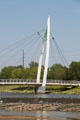 Pedestrian suspension bridge structure over Arkansas Rivers. Wichita, KS.