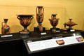 Collection of red on black Greek pottery at Museum of World Treasures. Wichita, KS.