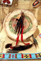 Plains Indian rawhide painted shield with feathers & buffalo tail at Sedgwick County Historical Museum. Wichita, KS.