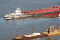 Tugs & barges on Mississippi River. Baton Rouge, LA.