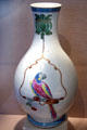 Porcelain vase with parrot from Qing Dynasty of China at New Orleans Museum of Art. New Orleans, LA.