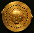 Akan peoples gold sun mask from Ashanti Kingdom, Ghana, at New Orleans Museum of Art. New Orleans, LA