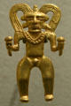 Gold pendant of man with headdress from Guanecoste Region of Costa Rica at New Orleans Museum of Art. New Orleans, LA.