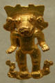 Gold pendant of animal with three heads from Guanecoste Region of Costa Rica at New Orleans Museum of Art. New Orleans, LA.