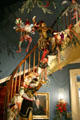 Christmas puppets on cantilevered spiral staircase at Houmas House. Burnside, LA.