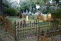 Cast iron fences around plots in graveyard of Grace Episcopal Church. St. Francisville, LA.