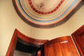 Curved end of hall with painted ceiling & curved door at Fall River Historical Society Museum. Fall River, MA.