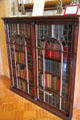 Leaded-glass mahogany bookcase at Rotch-Jones-Duff House. New Bedford, MA.