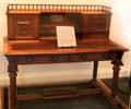 Resolute Desk made from timbers of HMS Resolute given by Queen Victoria to widow of Henry Grinnell of New Bedford in gratitude for attempts to rescue Sir John Franklin Arctic exploration party at New Bedford Whaling Museum. New Bedford, MA.