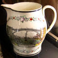 Creamware pottery jug with view of Iron Bridge at Sunderland, England at New Bedford Whaling Museum. New Bedford, MA.