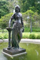 Memorial statue of young woman in Smith College botanical garden. Northampton, MA.
