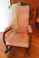 Upholstered rocking chair at Mayflower Society House. Plymouth, MA.