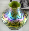 Trevaise iridescent vase by Alton Manufacturing Co. of Sandwich at Sandwich Glass Museum. Sandwich, MA.