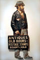 Book & stamp salesman tin advertising sign at Heritage Plantation. Sandwich, MA.