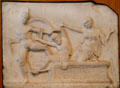 Roman carved marble relief of Death of Priam from Fiesole at Museum of Fine Arts. Boston, MA.