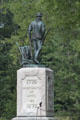Minute Man statue shows colonial with plow & musket at Minute Men National Historical Park. Concord, MA.