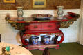 Red lacquer Buddhist altar table in dining room at Longfellow National Historic Site. Cambridge, MA.