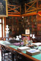 Interior of Stone Library at Peacefield with central table. Quincy, MA.