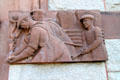 Shipbuilding workers carving by Joseph A. Coletti on Coletti addition of Quincy Public Library. Quincy, MA.
