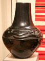 Earthenware water jar with polished black slip by Margaret Tafoya & Alcario Tafoya of Santa Clara Pueblo, NM at Museum of Fine Arts. Boston, MA.