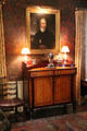 Portrait of Mr. Lee of Liverpool over American Empire maple sideboard in dining room at Nichols House Museum. Boston, MA.