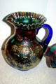 Pressed Carnival-glass pitcher by Fenton Art Glass Company, Williamstown, WV, in Maine State Museum. Augusta, ME.