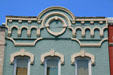 Heritage building on West Chicago Street with circle design on parapet. Coldwater, MI.