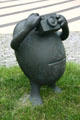 Photographer "Rockman" sculpture by Tom Otterness at US Federal Courthouse. Minneapolis, MN.