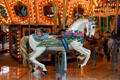 Flower decked white stallion on carousel in Mall of America. Minneapolis, MN