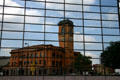 Milwaukee Road Depot reflected in modern building. Minneapolis, MN.