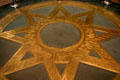 Inlaid star symbol of the North Star State on rotunda floor at Minnesota State Capitol. St. Paul, MN.