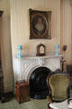 Bedroom fireplace & furniture at Chatillon-DeMenil Mansion. St. Louis, MO.