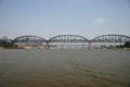 MacArthur Bridge over Mississippi River has truss rail & former road bridge. St Louis, MO.