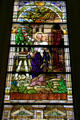 Stained glass window of Joseph holding Jesus at Kansas City Cathedral. Kansas City, MO.