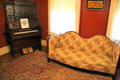 Organ & sofa at Lewis-Bingham-Waggoner House. Independence, MO.