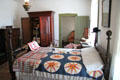 Bedroom with quilts in Jackson County Marshall's House. Independence, MO.