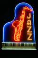 Neon sign of piano & sax for jazz club at American Jazz Museum. Kansas City, MO