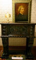 Mark Twain painting over carved walnut chest from his Hartford, CT home at Mark Twain Memorial Shrine. MO.