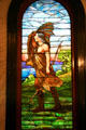 Stained glass window of native with bow on stairwell of Mississippi State Capitol. Jackson, MS.