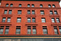 Upper story brick & terra cotta details of Hennessy Building. Butte, MT.