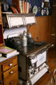 Antique Quick Meal wooden cooking stove in kitchen of Copper King Mansion. Butte, MT.