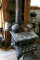 Wood stove of Pioneer Cabin at Reeder's Alley. Helena, MT.